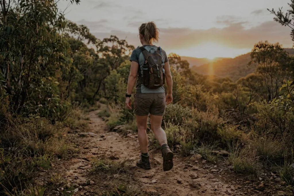Walking through the bush at sunrise, feeling the earth beneath their boots.